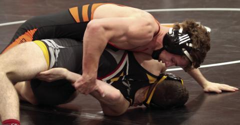 CHS Wrestler Kaiser Simpson had a good night, defeating his opponent by technical fall and being named homecoming king, 2023. Photo by J.D. Meisner.