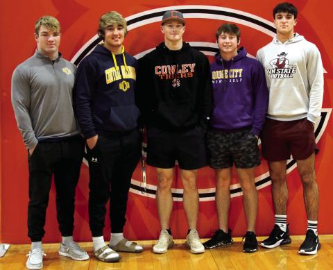 Five Cushing Tiger seniors signed to play sports at the next level last week. Riley Matheson and Brody Berlowitz will play baseball for UCO; Jacob Horn signed to play baseball for Cowley County College; Kolby Legg will play golf at Dodge City Community College and Blaze Berlowitz signed to play D1 football at New Mexico State University. Photo by Allie Prater.