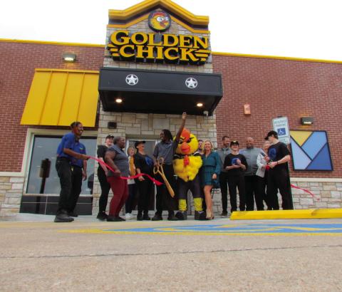 The official ribbon cutting for Golden Chick was held on Oct. 12 following the grand opening. Cushing Chamber of Commerce members as well as city officials and Golden Chick leadership, staff, and mascot Clucky were in attendance for the ceremony. Photo by DeAnna Maddox.