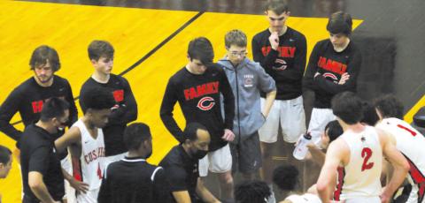 Above: Tiger Head Coach Jonteau Ezell maps out an inbound play during a late game timeout during the Cushing game against Bristow last Friday, Feb. 5. The Tigers fell to the Bristow Pirates 43-45.