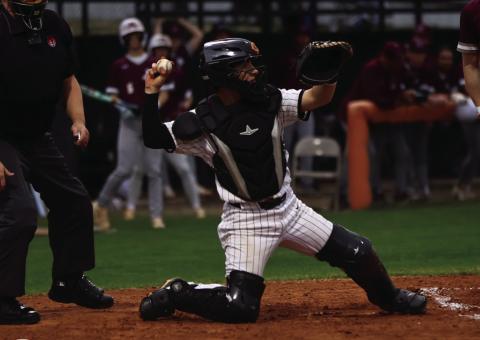 Braxton Colclasure loads up a pick-off throw during the Tiger’s opener against Ada. Photo by Sylvia Danyelle