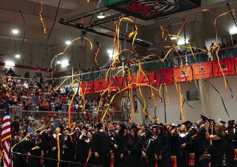 The Cushing High School Class of 2025 celebrate at the closing of Friday night’s graduation commencement ceremonies. Photo by J. D. Meisner