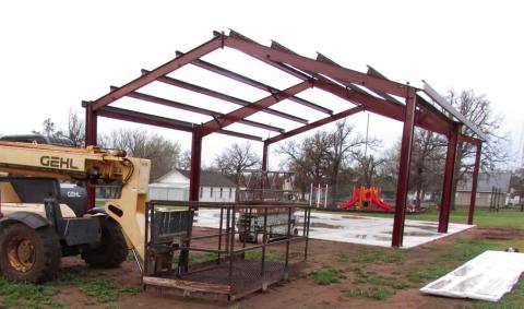 Last Thursday on March 21 material for the new Bearcat den roof sat out before being installed later in the day. Photo by DeAnna Maddox The playground area is open to the public when school is not in session and Kelly said it is a popular place for local families to come.