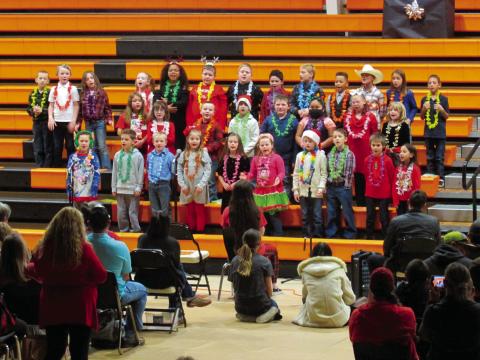 The third grade students at Agra Public School were ready for Christmas and vacation as they sang about all the places you can make your holidays merry and bright during the school’s annual Christmas program last Friday, Dec. 16. Photo by DeAnna Maddox.