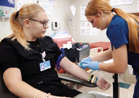 An Advanced Health Careers student at Central Tech practices.