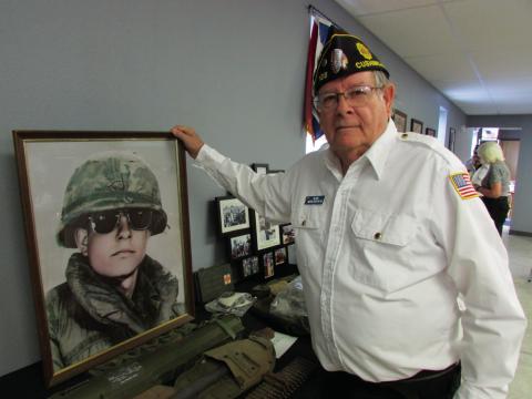 Vietnam Vet Jim James shows some of the memorabilia he acquired on his tour during the Vietnam War. Photo by DeAnna Maddox