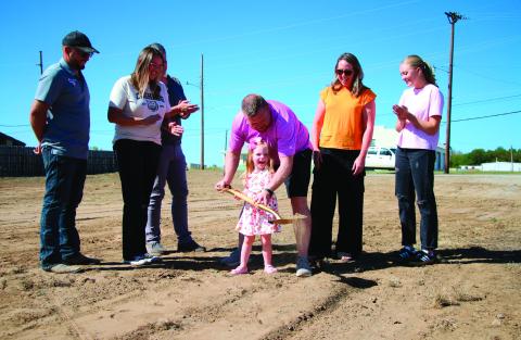 Lilah Beasley got a little help from her dad — Geoff Beasley to break ground at the future Dunkin Donuts building site. Geoff and Dawn Beasley alongside their daughters Lilah and Addy were at the location on Monday, Sept. 30 with friends and team members for the groundbreaking ceremony. Cushing Chamber of Commerce offi cials hosted a live feed on social media in which Geoff said the initial plan is to have the business up and running by May. CR Construction is contracted on the building and Brandon Wolff wi