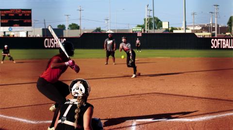 Lady Tiger Pitcher Macy Griffith delivers the heat during the Cushing Lady Tigers’ showcase Orange and Black scrimmage last Thursday. The Lady Tigers went 9-18 last season and reached the second round of the regional tournament. Photo by J. D. Meisner
