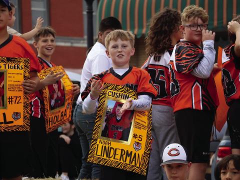 CUE football player Noah Linderman shows off his Tiger Spirit during the Homecoming Parade.