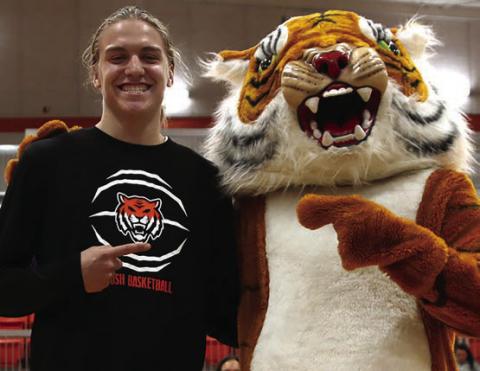Jasper Skelnik and Tony the Tiger smile for the camera. Photos by Amber Fausto.