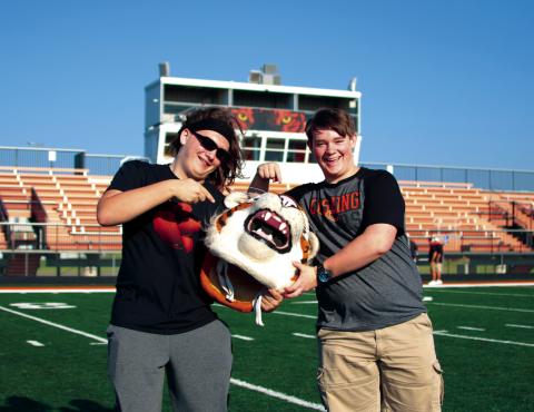 Dawson Claxton and T. J. Jenkins mug with Tony at Cushing High School’s football media days. The Tigers open their season at home on Friday, Sept. 2, against Bristow.