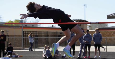 Cushing Tiger Roman Tucker clears the bar for the boys high jump.