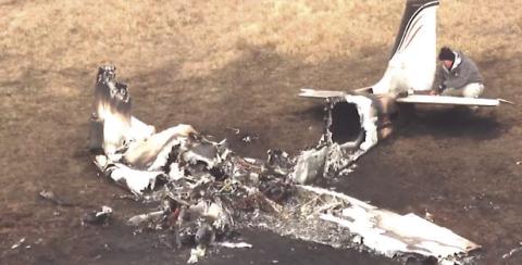 1971 Beechcraft Bonanza wreckage after emergency crews extinguished the fire. Aerial photo courtesy KFOR News.