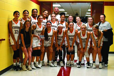 On Saturday, Nov. 11, the 8th Grade Lady Tiger Basketball team took third place in the Cleveland Basketball Tournament. They lost by 1 to Regent Prep in the semi finals, and beat Cleveland by 2 points to take third place. Photo by Sarah Townes
