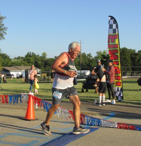 Tyson Branyan — Cushing Rotarian, city commissioner, and Grappler’s Gallop 5K participant crosses the finish line last Saturday, Sept. 30.