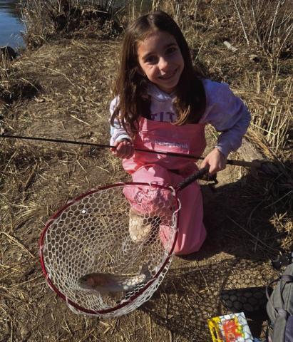 Grey Sanger with a trout caught at the Blue River. Share your photos with us on Facebook.