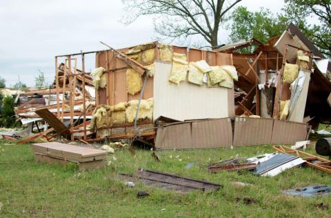 Scrap wood and insulation is all that remains of a vacant mobile home on Kimberly and Jeff Willson’s property near Ripley after a strong F1 tornado touched down Monday. Photo by J. D. Meisner