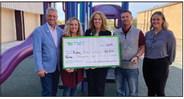 Rep. John Talley, Ripley Elementary School Principal Kerri Brewer, TSET Executive Director Julie Bisbee, Ripley Public Schools Superintendent Kaleb Hoffman and Health Living Program Assistant Coordinator Shelby Keller display a $12,000 check Ripley Public Schools received from TSET recently.