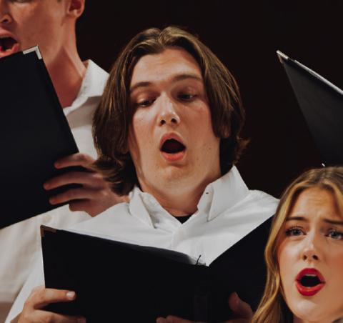 Dawson Claxton performing among students from across Oklahoma at OSAI.
