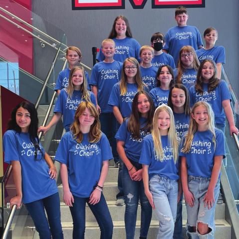 The sixth grade choir students inside the Mustang school during their recent May 5 competition. They received superiors from the judges and went on to be awarded an outstanding achievement plaque.