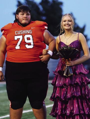 King candidate Tye Lucio escorts queen candidate Addy Beasley. Photos by Cindy Wayland.