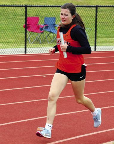 Romy Withiam sprints toward the finish. Withiam competed in the 4x200, 4x400 and 4x800 meter relays.