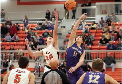 Tiger Lane Yaunt goes for the tip, to start off what proved to be an evenly matched, hard fought contest against Mannford Friday. Photo by Kaleb Tadpole