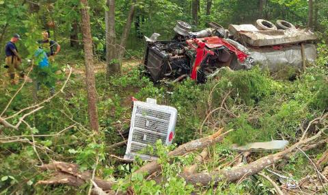 Ingalls VFD Tanker 1 lays in the trees following a crash Thursday afternoon.