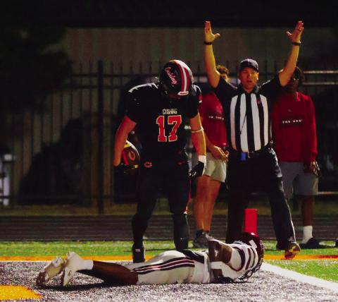 Cushing receiver Bryce Ward casts a little shade after a touchdown catch. Photo by Sylvia Danyele