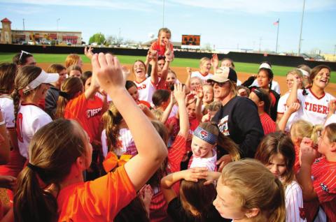 It was youth day last Thursday at the Lady Tiger Softball field and Lady Tiger Head Coach Nikki York brought all the girls together on the field for a pre-game breakout. Photos by Allie Prater.