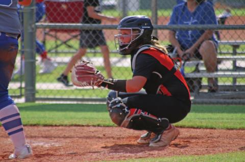 Veteran catcher Madison Alexander in her natural habitat, protecting the plate.
