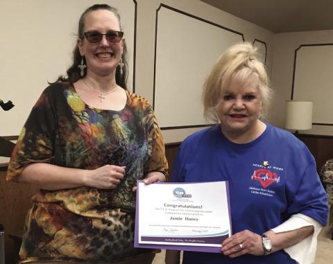 The Cushing Philanthropic Educational Organization (PEO) chairman Kay Turner presents a certificate for being the recipient of the PEO Program for Continuing Education to Cushing resident Jamie Haney. Photo courtesy Marylin Duff.