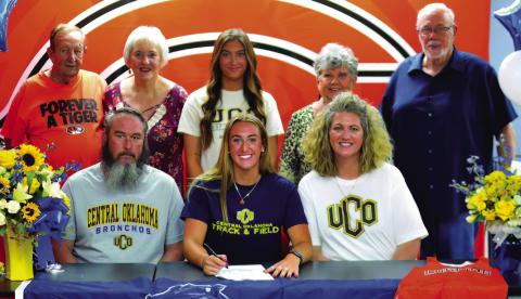 Senior Cushing Tiger athlete Karly Clemons recently signed a letter of intent to run track for the UCO Broncho track and field team.Joining Carly at the signing event were, back row from left, grandparents Cliff and Vickie Case, cousin Jaylee Matthews and grandparents Joy and Don Kindley. Front row from left, father Gunn Clemons, Karly Clemons and mother Crissy Kindley.