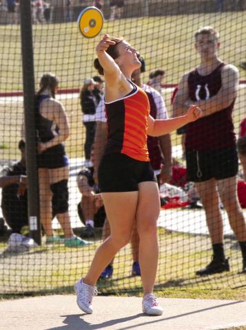 Gracyn Presley delivers a throw in the discus competition at the Cushing Crossroads Relay last week, where she finished as runner-up with a mark of 102 feet, 10 inches. Photo by Allie Prater. See inside for more results.