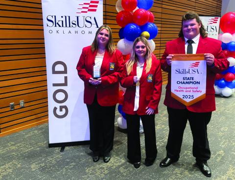 Earning 1st place for Occupational Health and Safety-Multiple Sections for secondary students is (L-R) Keylee Powell, Mannford; Emilee Stephenson, Mannford; Billy Combs, Cushing.
