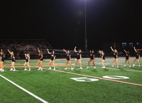 The Cushing Tigers Dance Team strut their stuff at the homecoming game