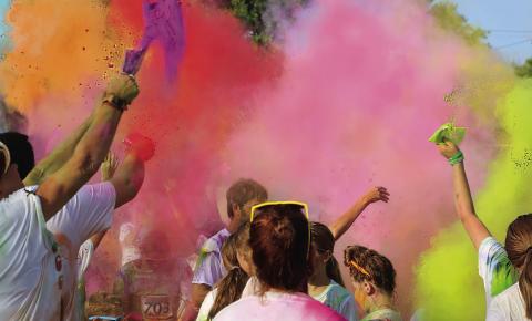 Cushing Geographic Club Do or Dye Color Run participants gather at the end of the race for a color explosion, Saturday, Aug. 19 at Memorial Park. Photo by Allie Prater