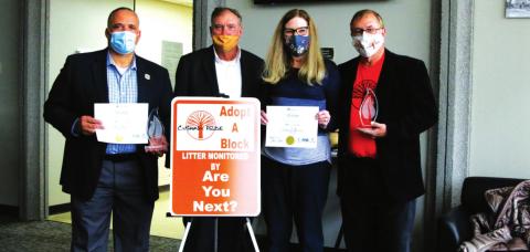 City Manager Terry Brannon, Keep Oklahoma Beautiful’s Jim Evers, Volunteer Marie Thackray and Cushing Pride Executive Director Richard Thackray, celebrate the. Honors Brannon and Thackray received recently during the virtual Keep Oklahoma Beautiful awards banquet.
