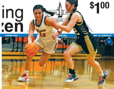 Lady Tiger Ella Nanaeto drives to the rim in the Cushing Lady Tigers final game of the season against the Woodward Lady Boomers. Cushing lost to the 11-16 Lady Boomers 38-41. Photo by Amber Fausto