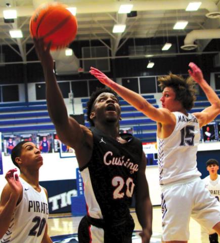 Noah Jones beats the defenders down the lane.