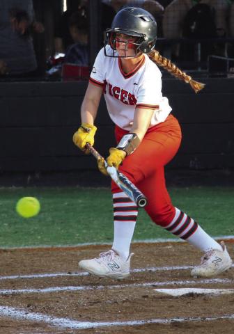 Cushing Lady Tiger Alyssa Roe lays down a textbook bunt against the Mannford Lady Pirates last week. Photo by Allie Prater