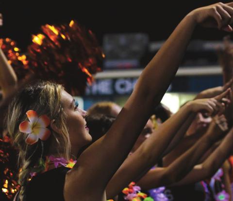 Kinley Witt and the rest of the Tiger cheerleading squad keep fans amped up in Berryhill.