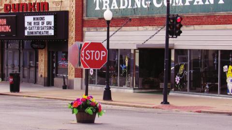 Flower Pot Stop Signs installed on Broadway