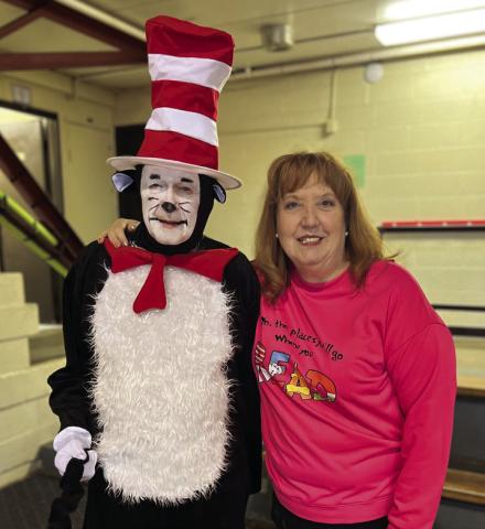 Don McCroskey wearing black, white, and red all over as the beloved Dr. Suess character, The Cat in the Hat, alongside CPK Principal Sally Wright. Picture courtesy of Sally Wright.