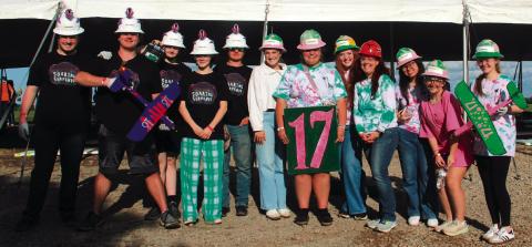 Cushing High School aeronautics Team 17 and Team 18 members stand with their instructor Dr. Jessica Sigle at Speedfest XV in Stillwater.