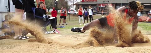Cushing Senior Noah Jones competes in the long jump during the Cushing Track Meet. Noah placed fifth with a jump of 19’00.05”. Photo by Cindy Wayland.