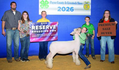 Blaire Mitchell of Cimarron Valley 4-H poses with her Dorset breeding ewe. Mitchell earned Reserve Champion with her Dorset Breeding Ewe in Class 1 and also had multiple placings in swine and gilt classes during the show. Photo by Meagan Stephens.