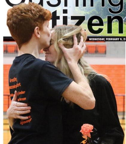 CHS Wrestling senior Owen Collier gives his mom Annie Collier a kiss on the forehead during the CHS Wrestling Senior Night festivities Tuesday, Jan. 28. Photo by Allie Prater