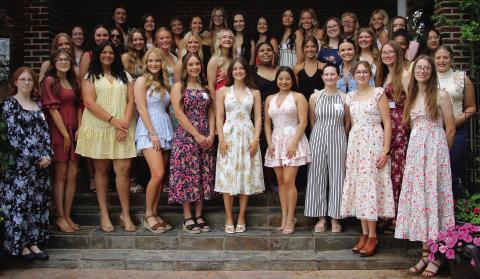 The young women of the class of 2025 gather on the steps of Betsy Hibbard’s home Monday, April 28, during the 105th annual Cushing Geographic Club Senior Tea. See more photos on page 9. Photo by Allie Prater.