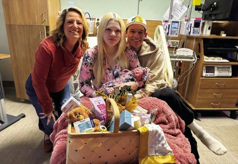 Kammy Peters, director of Women's Health at Stillwater Medical stands with Karrie Tull of Jennings and Braden Morrison of Mannford holding their newborn daughter, Emry Morrison, who was born at 4:40 a.m. Jan. 2 and is the first baby of 2026 at Stillwater Medical. The family was presented with a gift basket from hospital staff to mark the occasion.